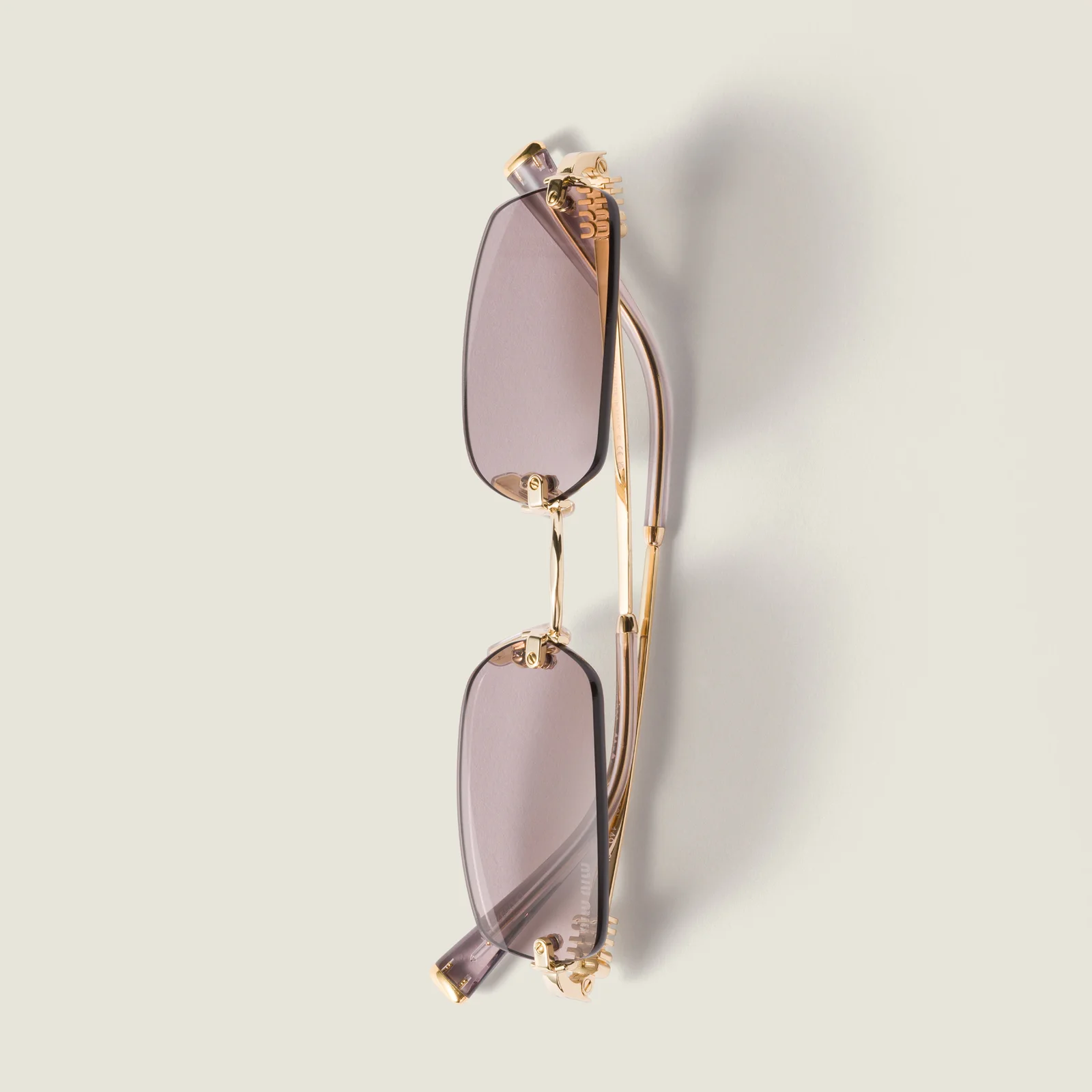 Солнцезащитные очки Miu Miu — фото 5