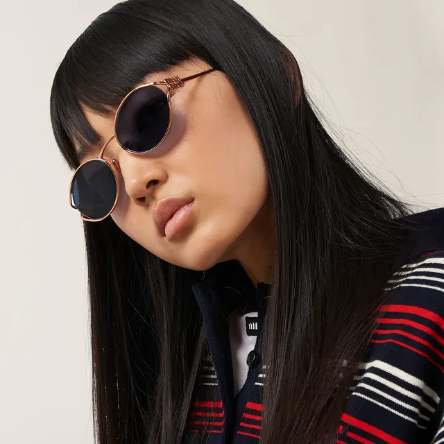 Солнцезащитные очки с логотипом Miu Miu