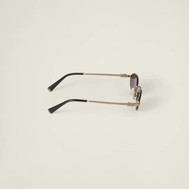 Солнцезащитные очки Miu Miu