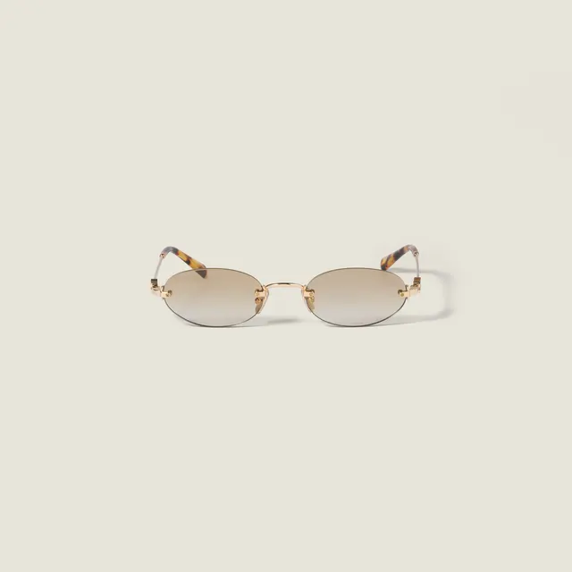 Солнцезащитные очки Miu Miu