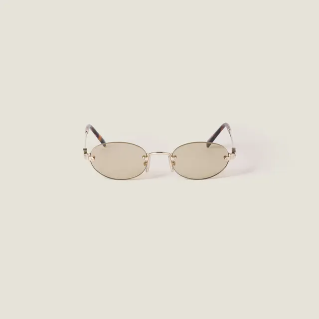 Солнцезащитные очки Miu Miu