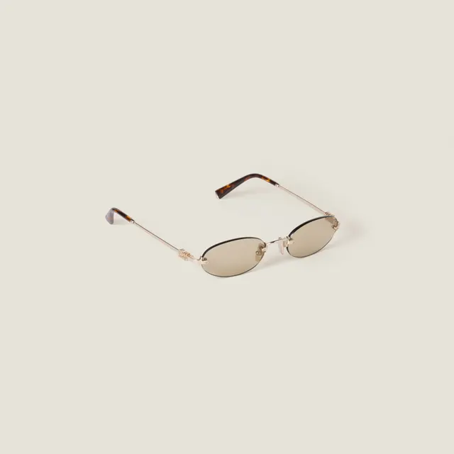 Солнцезащитные очки Miu Miu
