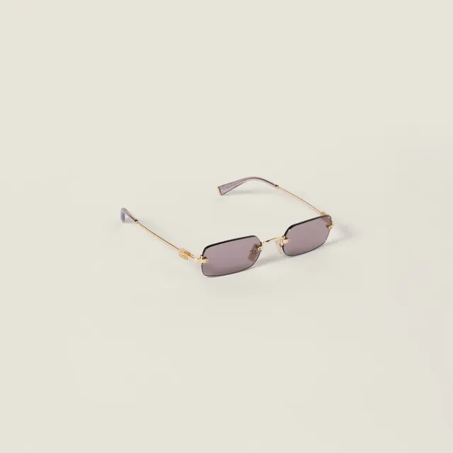 Солнцезащитные очки Miu Miu