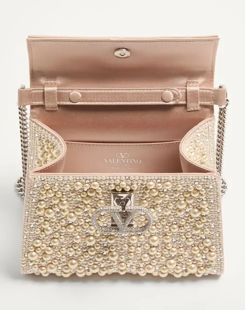 Мини-сумка с ручкой Valentino Garavani VSLING с жемчугом, стразами и ювелирным логотипом