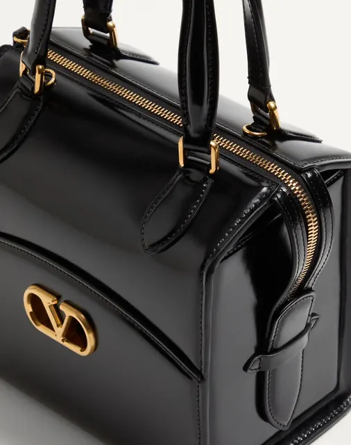 Сумка-боулинг Valentino Garavani Vain-Case из глянцевой телячьей кожи