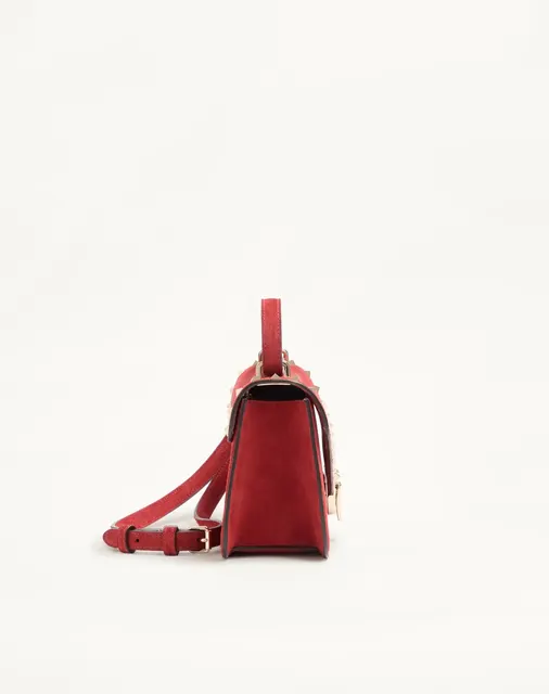 Маленькая сумка через плечо Valentino Garavani Rockstud из замши