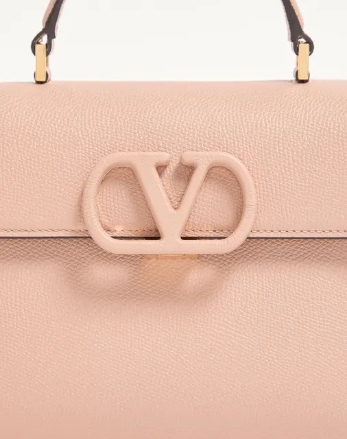 Маленькая сумка с ручками Valentino Garavani VSLING из зернистой телячьей кожи