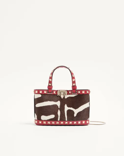 Мини-сумка-тоут Valentino Garavani Rockstud из телячьей кожи с ворсистой отделкой и анималистичным принтом